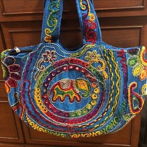 Indian handbag with zipper.